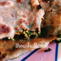A picture of Paneer Methi Paratha - Cottage Cheese Fenugreek Leaves Flatbread.