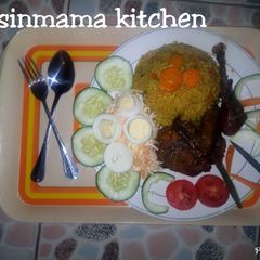 A picture of Fried rice with pepper chicken.