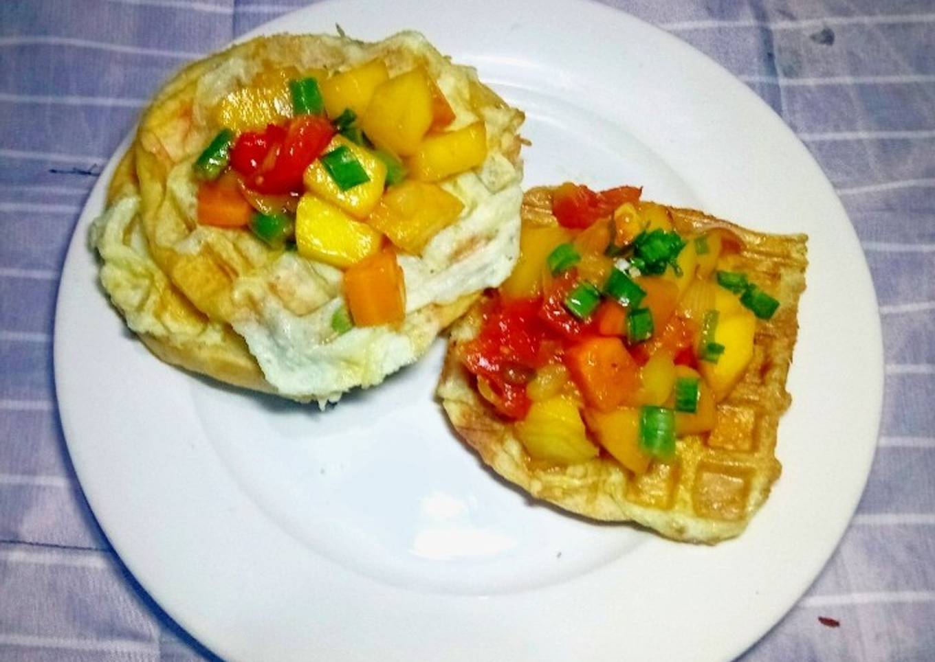 Waffles and Omellet topped with glazed Honey Tomato Mango Salsa