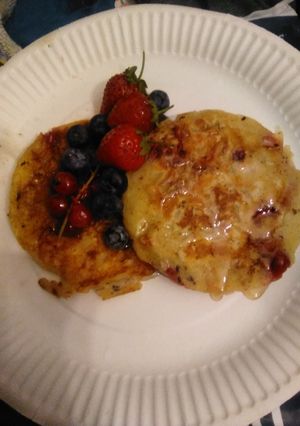 A picture of Strawberry 🍓 and red currant pancakes.
