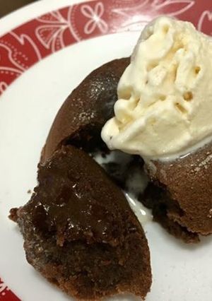 A picture of Molten lava cake with vanilla icecream.