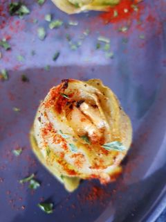 Une photo de Courgettes roulées farcies au chèvre frais