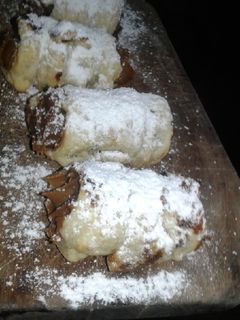 Una foto de Cañoncitos de dulce de leche