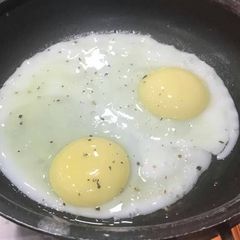 A picture of Sunny side up eggs.