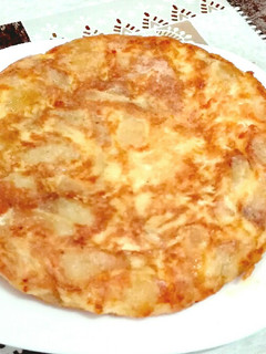 Una foto de Tortilla pequeña de patatas y mozzarella