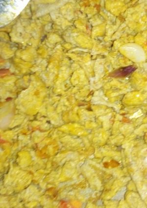 A picture of Palm oil scrambled egg.