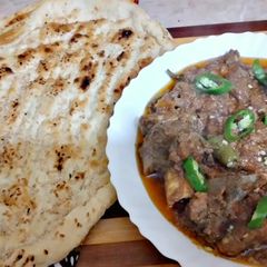 Peshawari Style Mutton Qorma with Irani Nan A picture of Peshawari Style Mutton Qorma with Irani Nan.