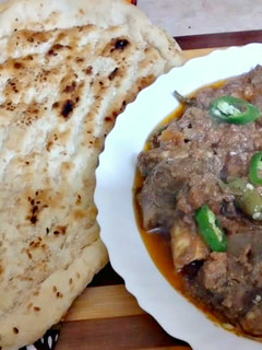 A picture of Peshawari Style Mutton Qorma with Irani Nan.