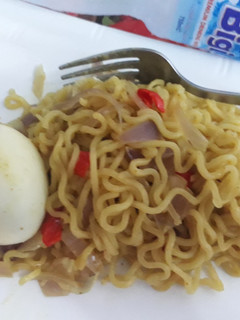 A picture of Indomine with boiled egg.