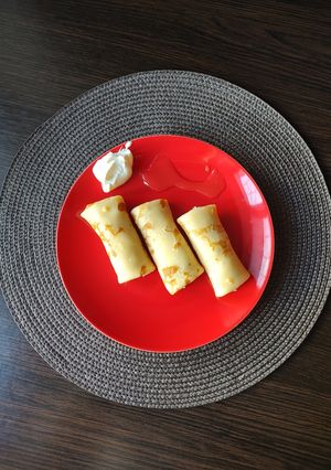Фото Млинці🥞з кисломолочним сиром та родзинками.