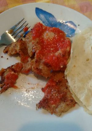Una foto de Milanesas de cerdo. ॐ