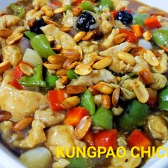 A picture of Kungpao Chicken with vegetables /Chinese recipe.