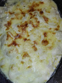 Una foto de Gratinado de coliflor y espinacas con queso y beicon