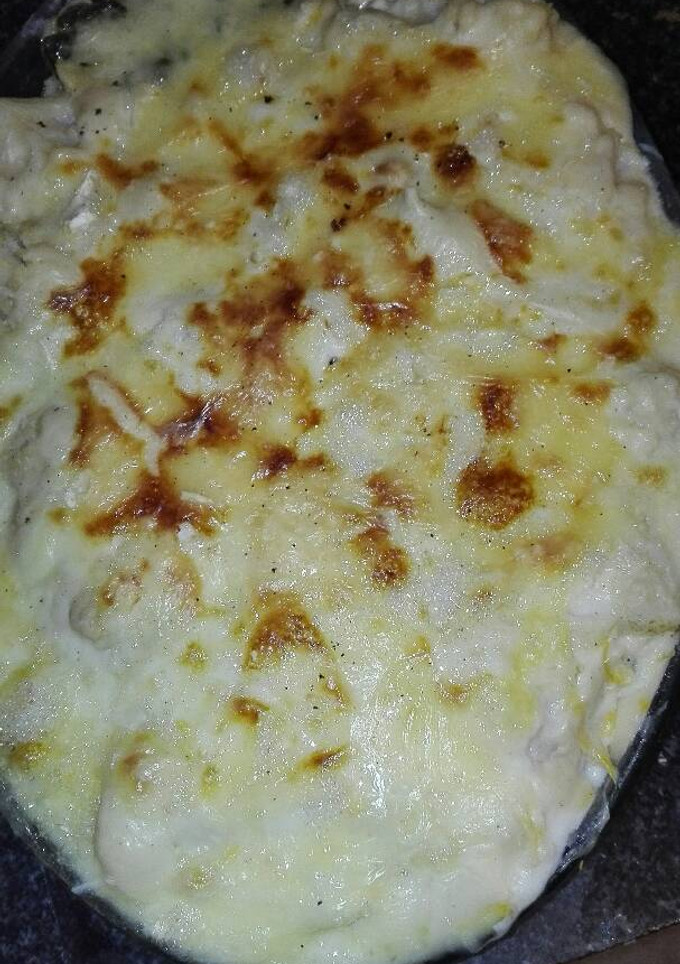 Una foto de Gratinado de coliflor y espinacas con queso y beicon 