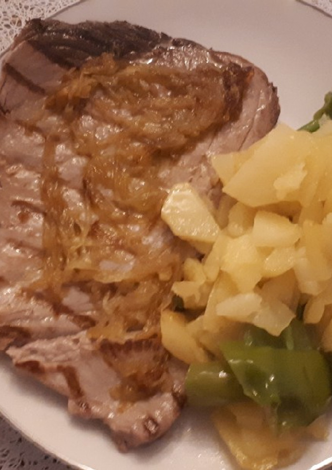 Una foto de Atún con cebollita caramelizada
