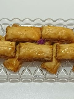 عکسی از دستور باقلوا پنیری و آجیلی با عسل و شکر سرخ