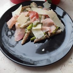 A picture of Aspargus pasta with cured ham and chervil.