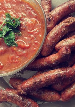 Une photo de Saucisse à la sauce tomate