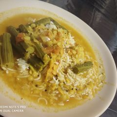 A picture of Drumstick dal with rice.
