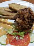 Muslo de pollo semideshuesado rebozado