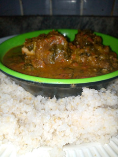 A picture of Rice& wheat granules with sorrel soup. (#biski da miyar yakuwa).