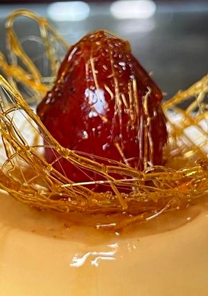 A picture of Mini egg pudding with spun sugar nest.