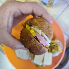 A picture of Polony, atchar and cheese fat cake.