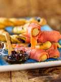 Grissini Integrali con Olive e Pistacchi avvolti da Carpaccio di Salmone Selvaggio