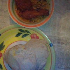 Egusi soup, chicken and pounded yam A picture of Egusi soup, chicken and pounded yam.