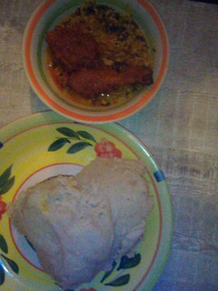 A picture of Egusi soup, chicken and pounded yam.