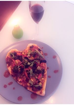 A picture of Heart Shaped Pizza.