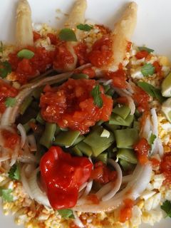 Una foto de Ensalada de judías verdes con vinagreta de tomates