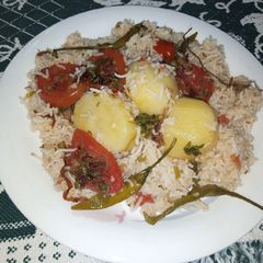 A picture of Potato And Tomato Pulao.