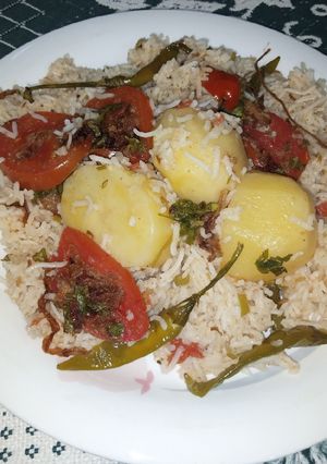 A picture of Potato And Tomato Pulao.