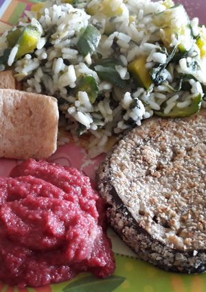 Una foto de Arroz con Salteado de Cebolla y zapallitos!