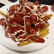 Salchipapas aliñadas
