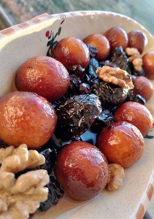 صورة لوصفة 🍴طاجين حلو بمرقة زجاجية مع كرات او سفيرية جوز الهند لي يزيدولها بنة على بنة 🍴