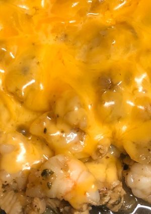 A picture of Chicken & shrimp cheese steak.