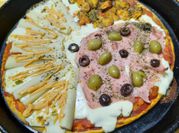 Una foto de pizza salsa golf