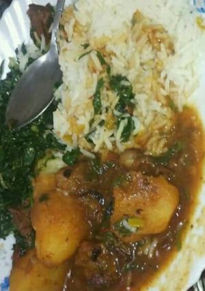 A picture of Beef Stew with Waru, Served with Rice and Saute kales.