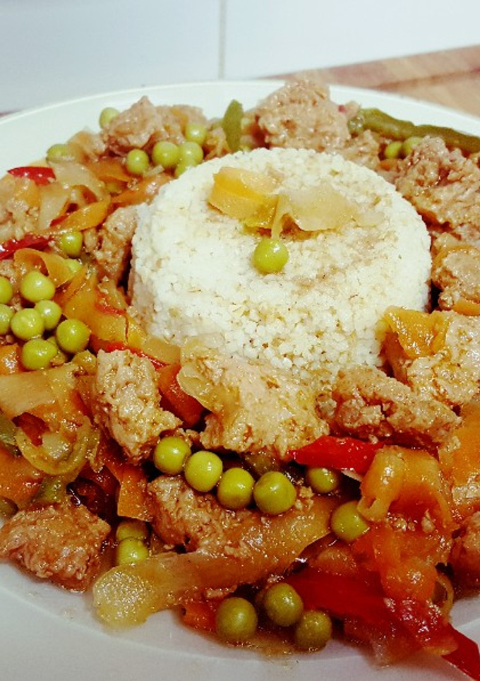 Una foto de Corona de verduras y guisantes al lemon grass
