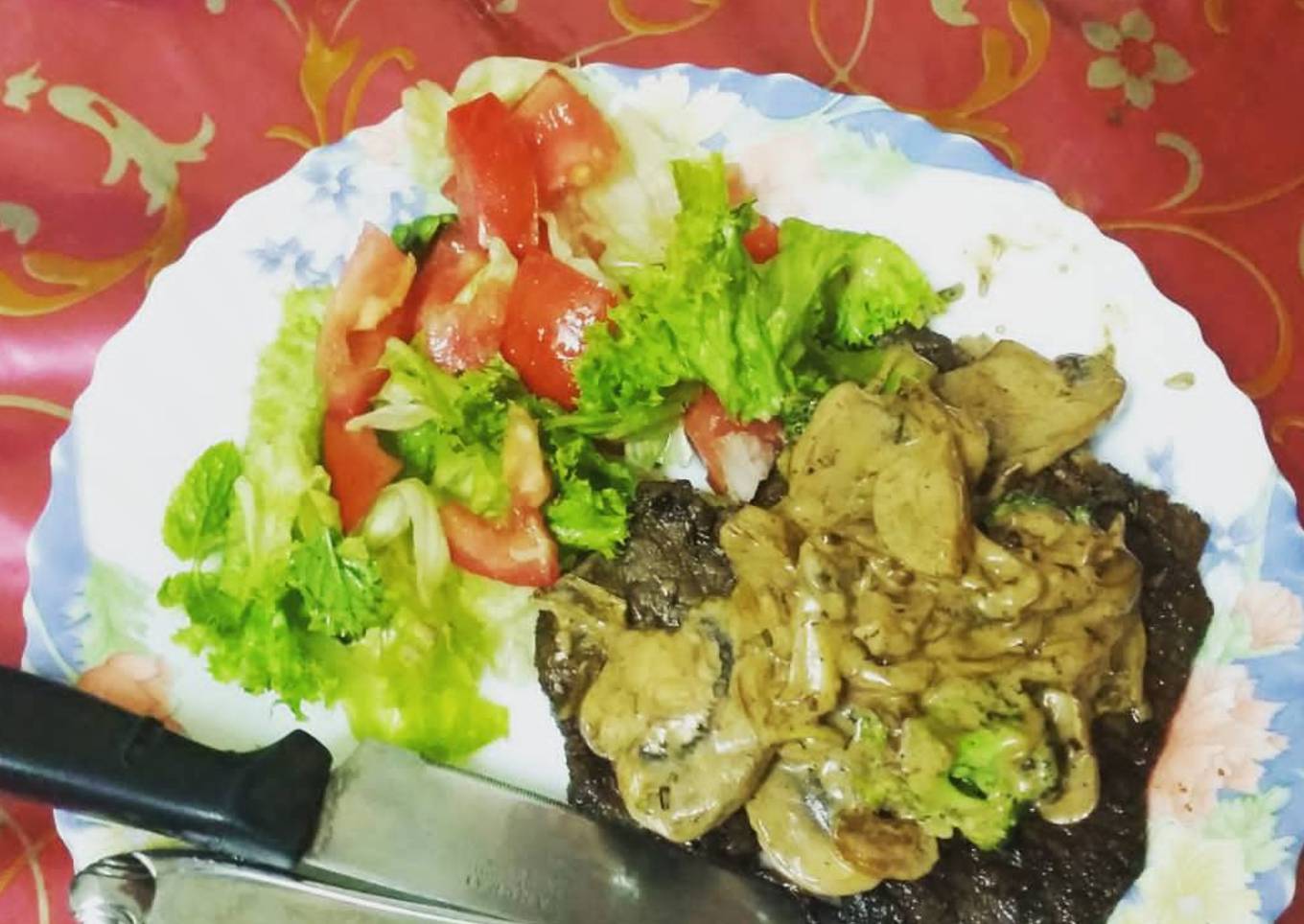 Grilled beef with mushroom sauce