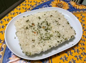 Une photo de Riz moulé au saindoux et herbes aromatiques