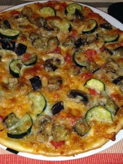 Una foto de Pizza vegetal