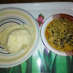 A picture of Semovita and egusi soup.