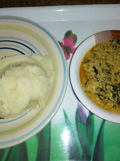 A picture of Semovita and egusi soup.