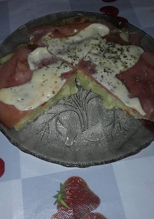 Una foto de Tortilla de papa a la napolitana