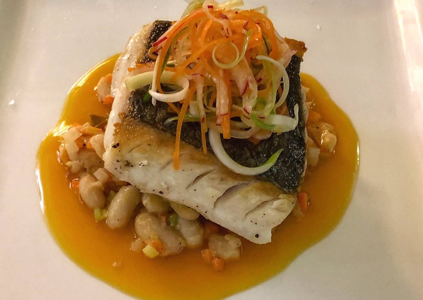 Blue eye cod with cannelloni beans, scallion and radish salad with soy orange glaze