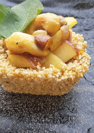 A picture of Rajgira jaggery tart with caramelized apple and nuts.