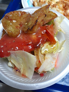 A picture of Tomato Sauté with Salad.